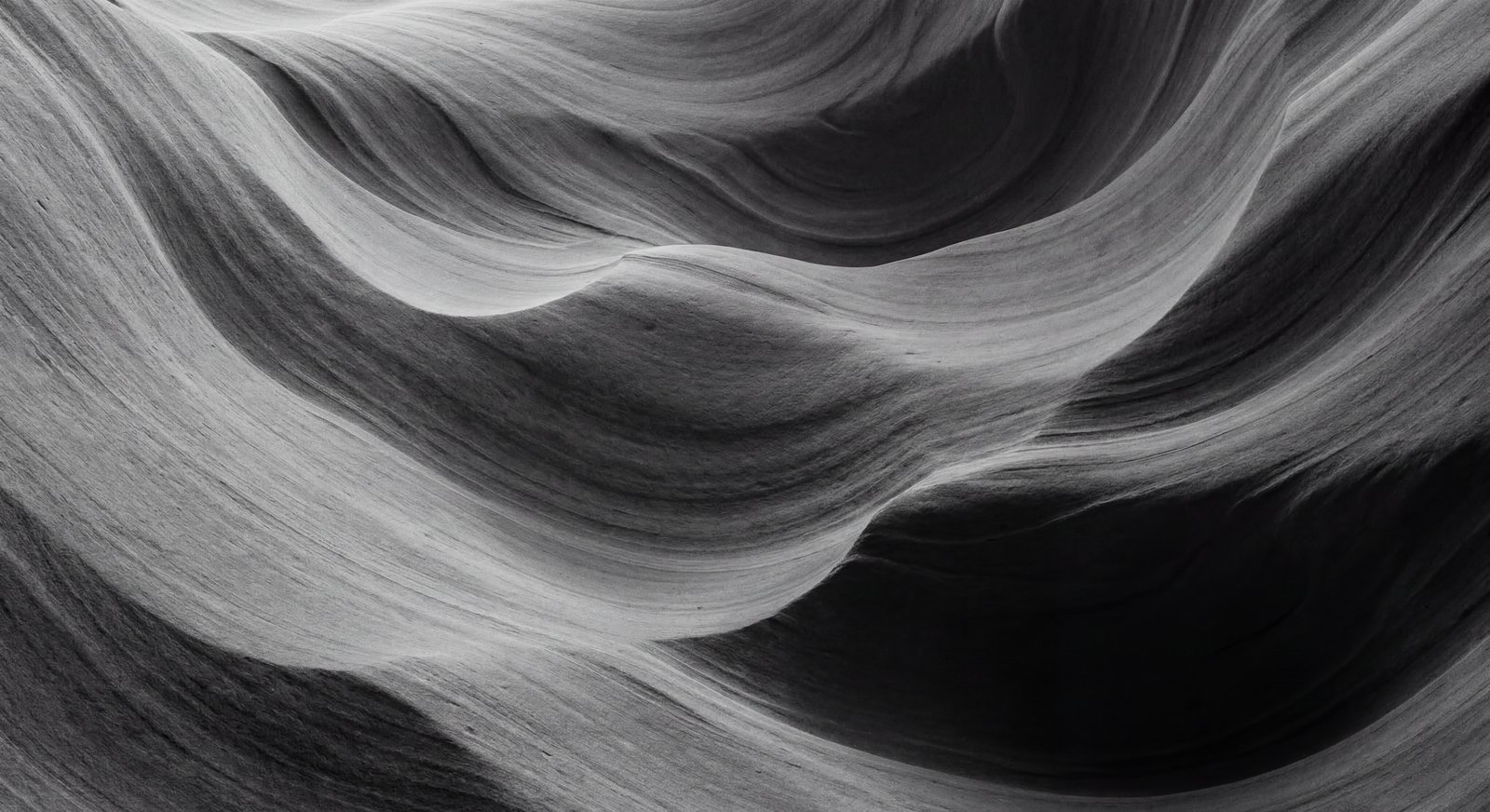 Sandstone canyon. Continuous curvature across layered surfaces.