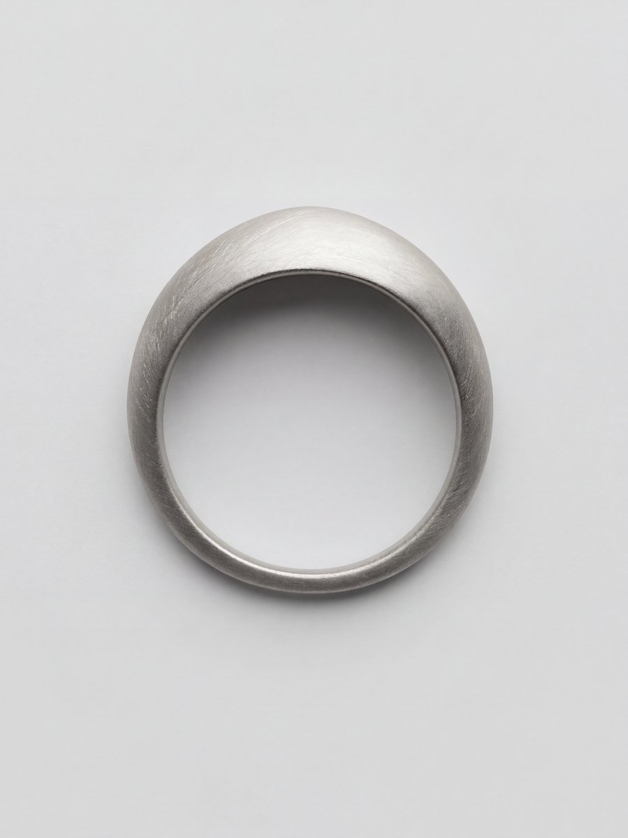 R.01, recycled sterling silver, front view showing dome and widening from base to top.